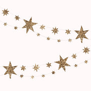 A double lined star garland made of thick paper along with chunky gold glitter on the front. The stars vary in size and alternate.