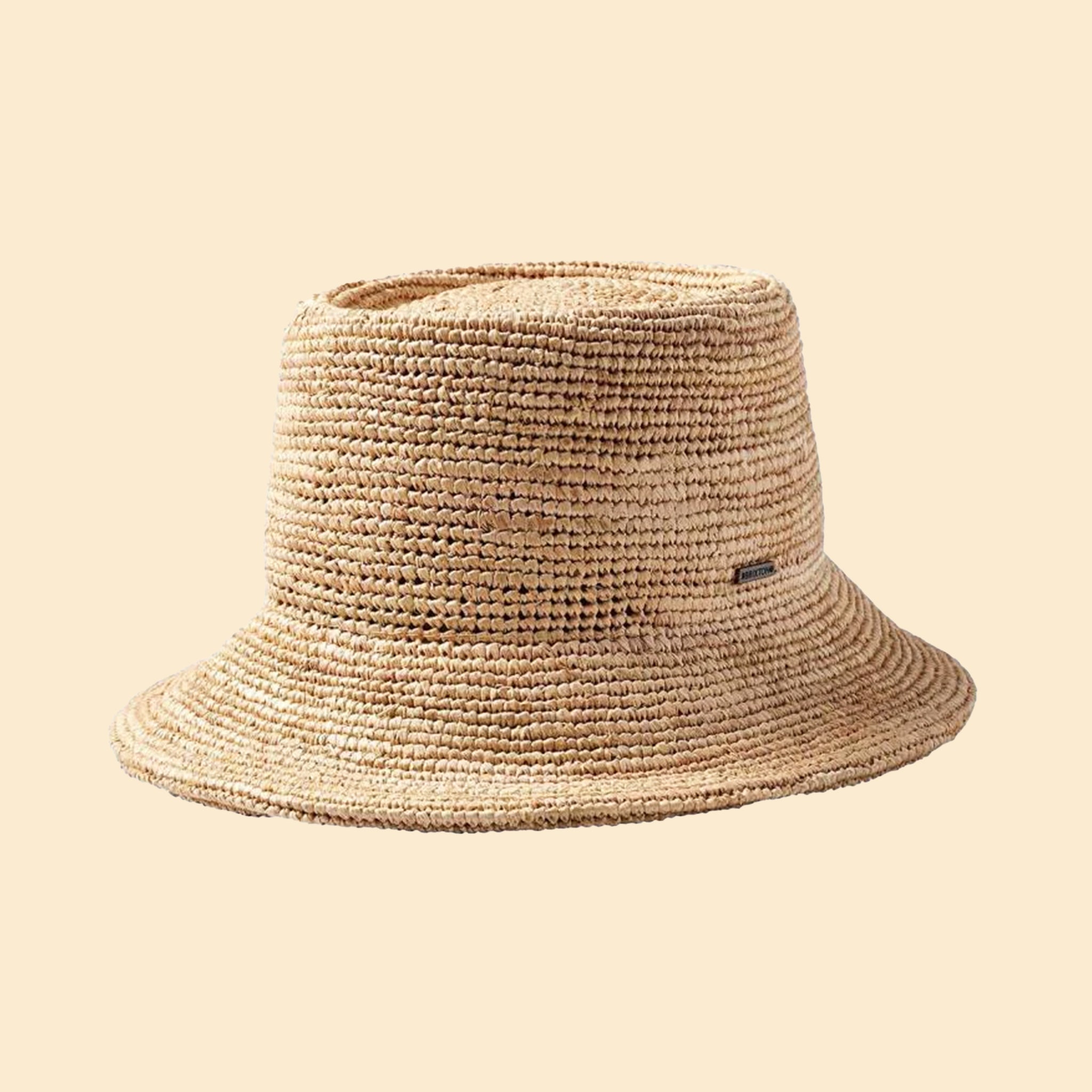 A neutral straw bucket hat.