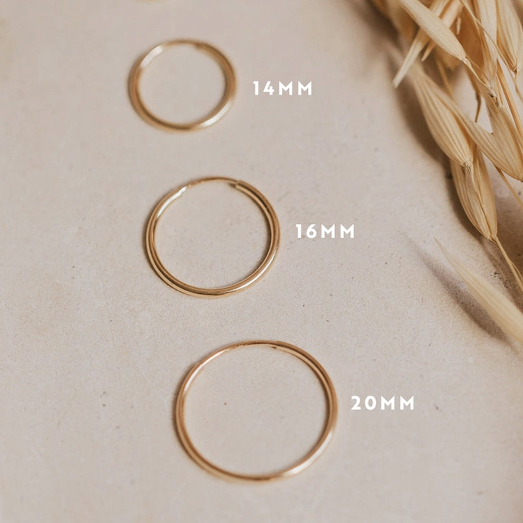 Three different sized thin hoops. 