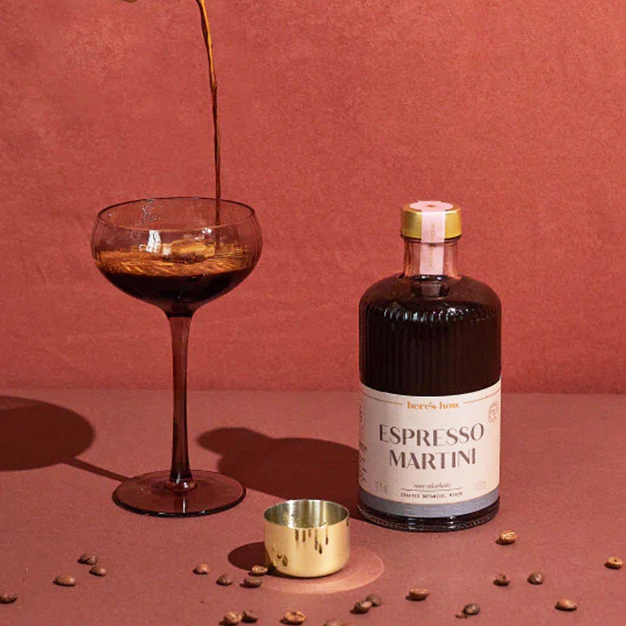 A glass bottle of espresso martini cocktail mix with text that reads, &#39;Espresso Martini&#39;. 