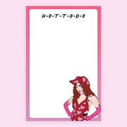 A white notepad with an illustration of musical artist Chappell Roan at the bottom right corner. The borders of the notepad are pink and the text at top reads "H-O-T-T-O-D-O"