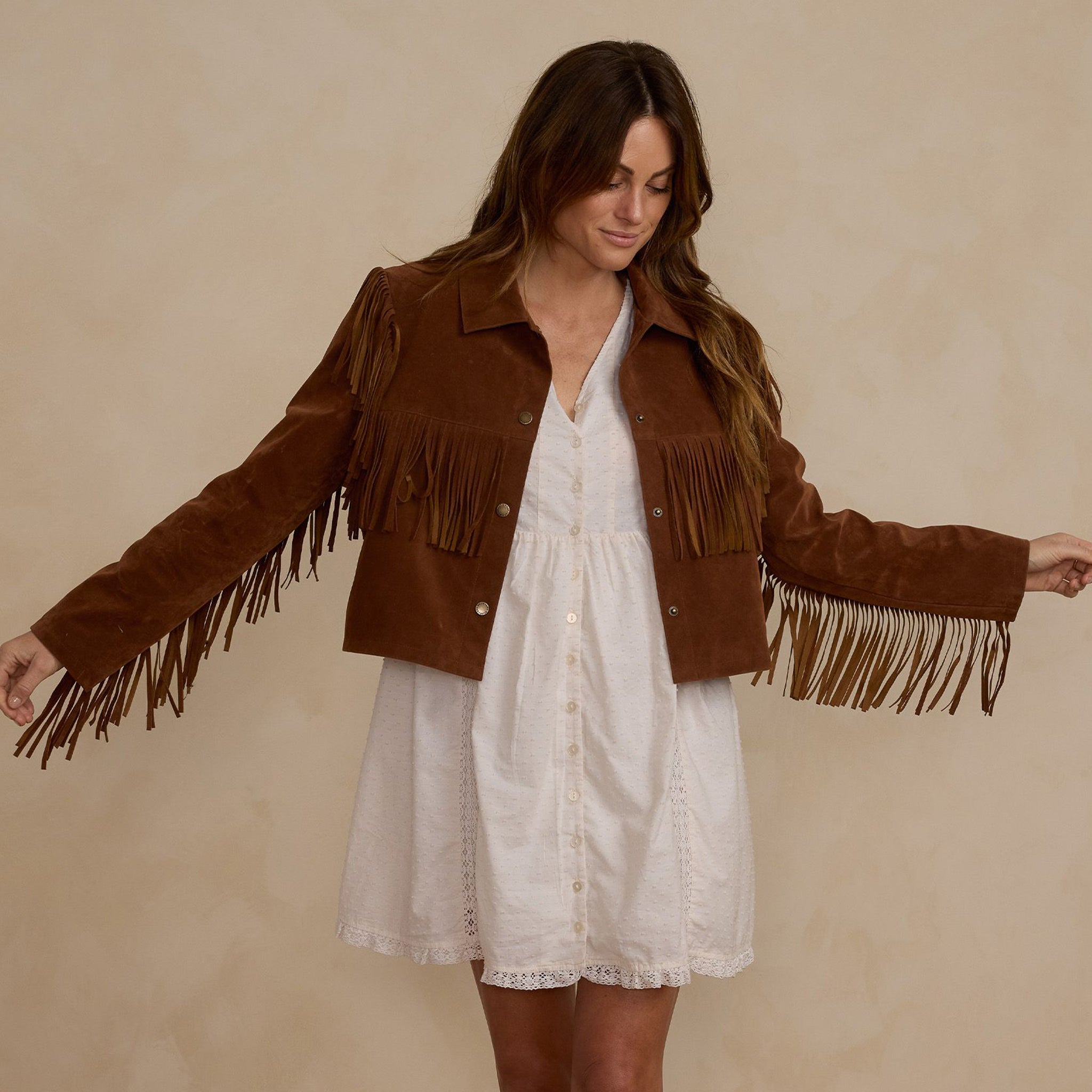 A brown suede fringe jacket. 