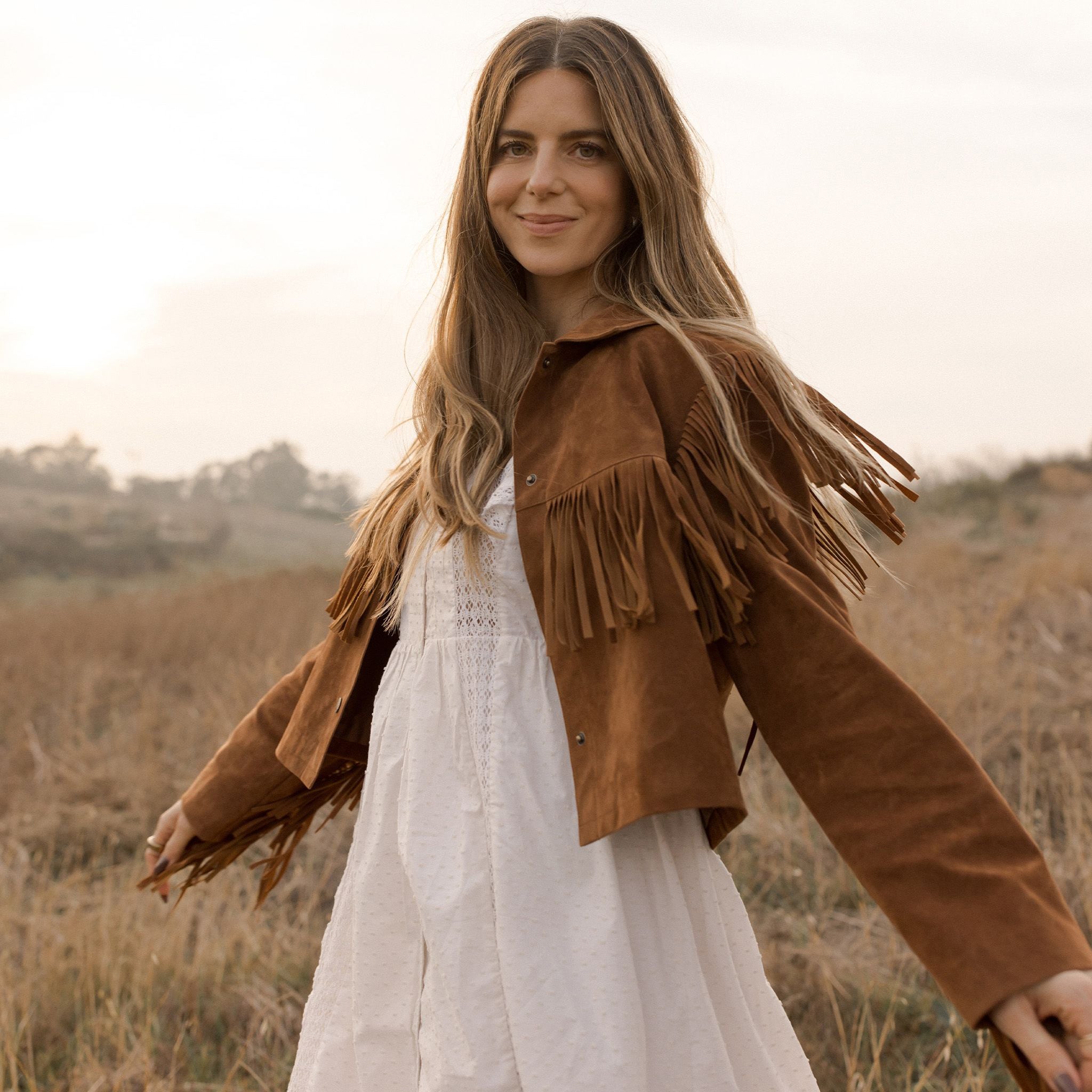 A brown suede fringe jacket.