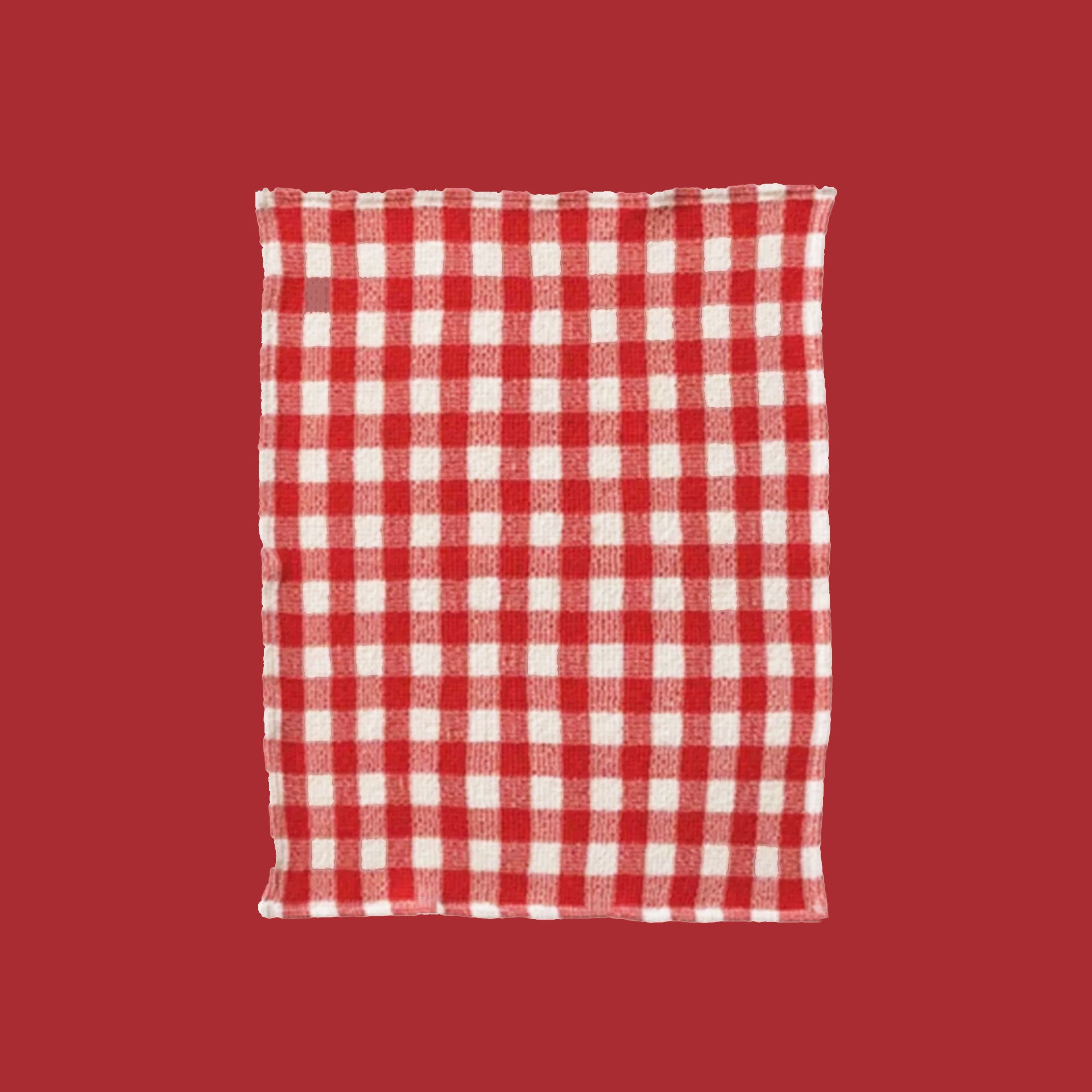 A red and white gingham print tea towel. 