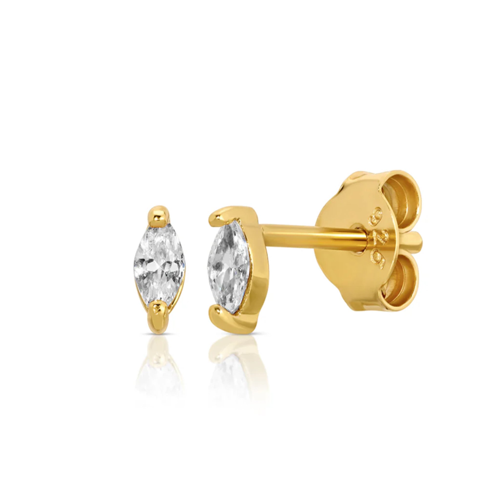 A marquise shaped pair of CZ stone stud earrings in a gold setting. 