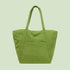 A green puffer tote bag. 