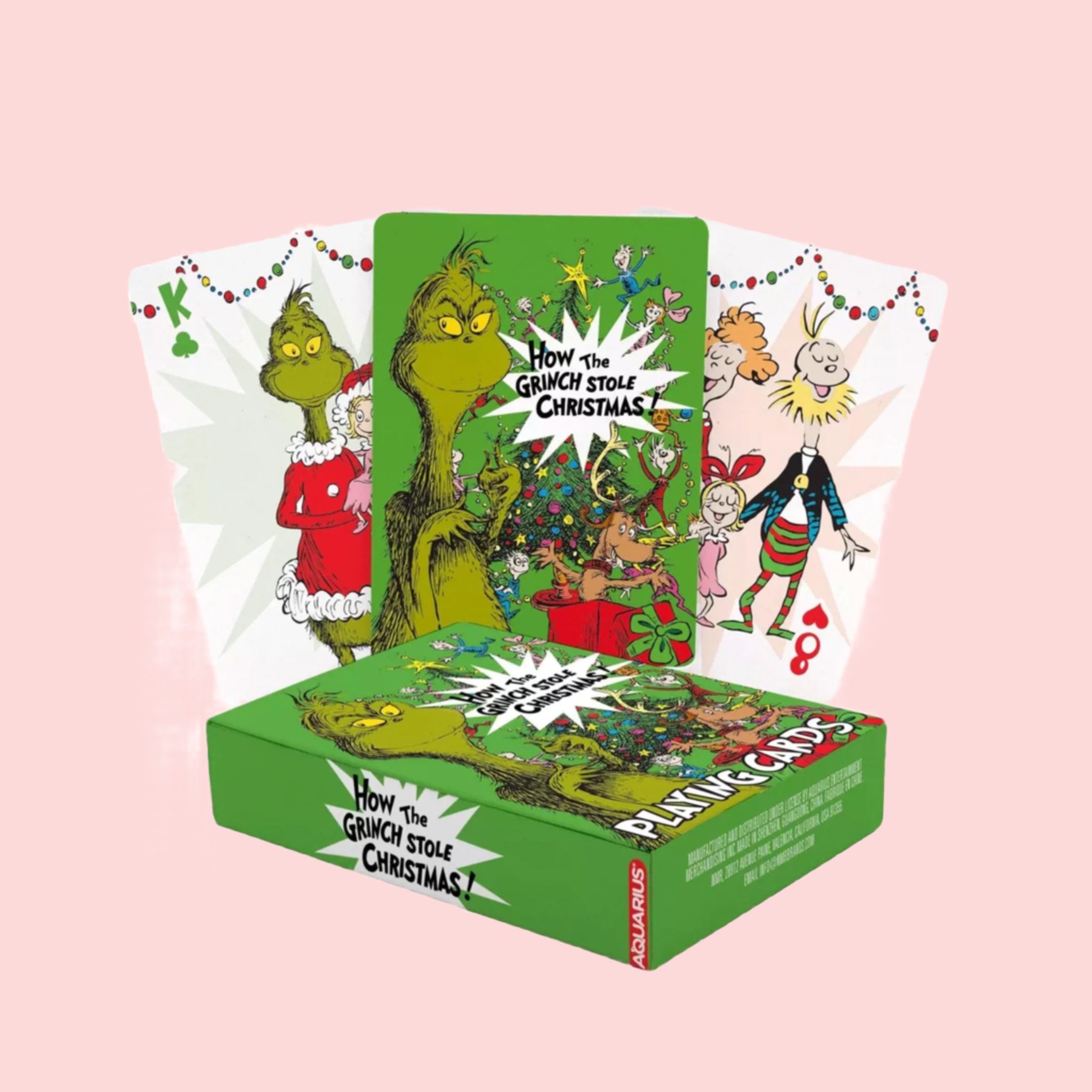 A deck of green Grinch themed playing cards. 