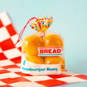 A bag of hamburger buns shaped ornament. 