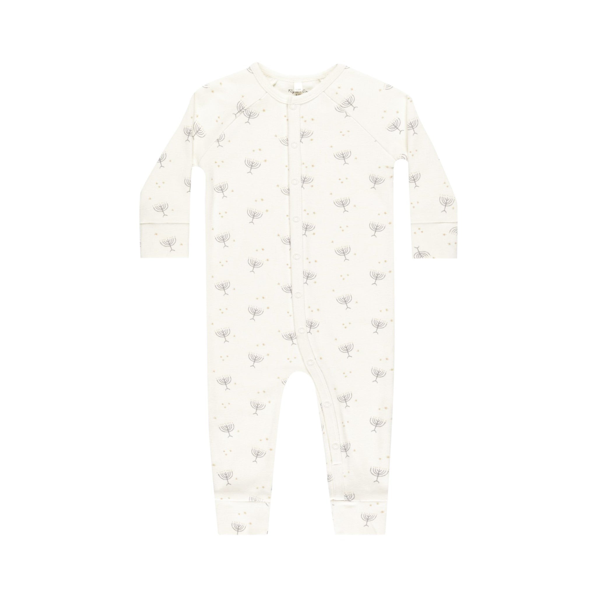 A cream colored long john pajamas with a menorah Hanukkah print. 