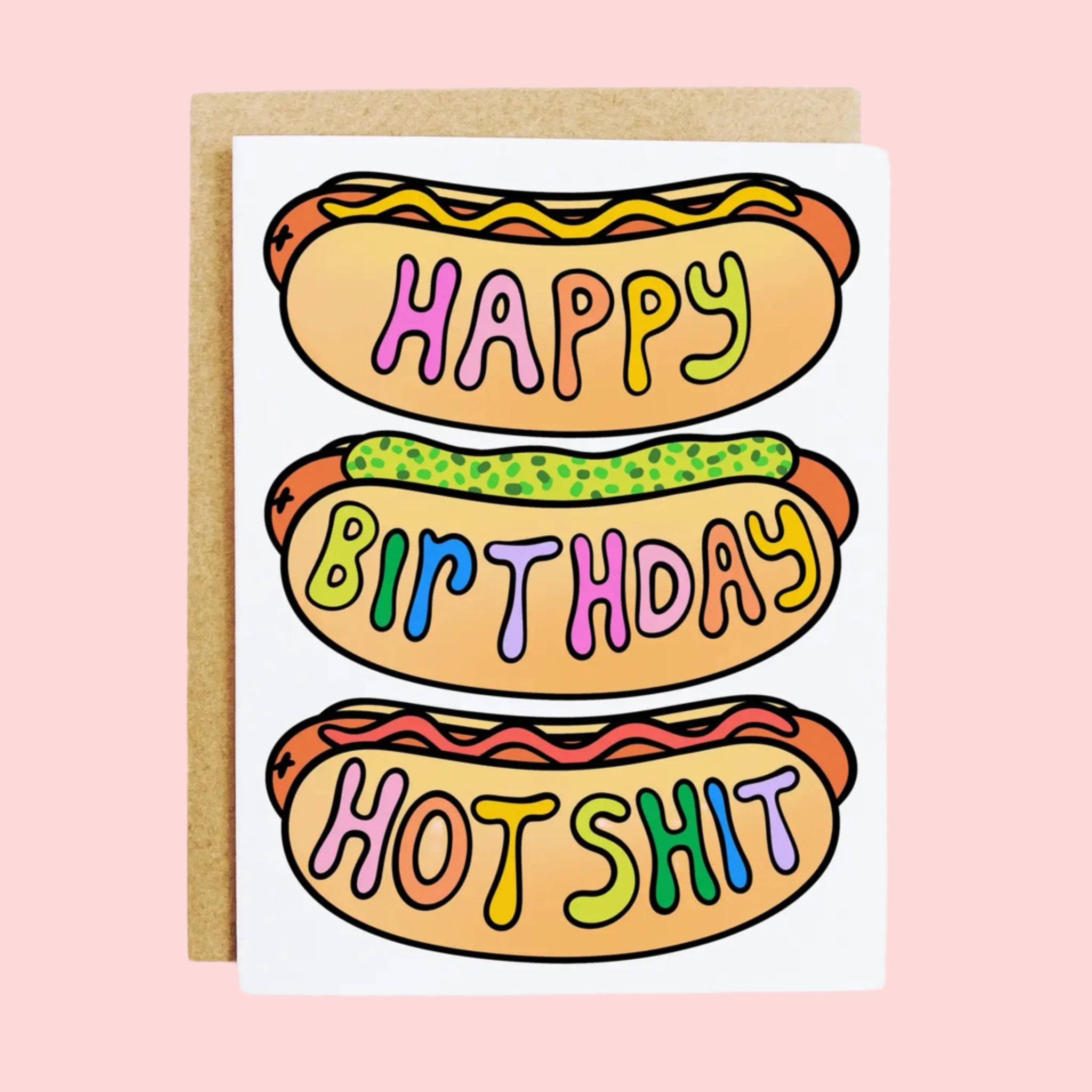 A birthday card with an illustration of three hot dogs with multi colored text that reads, 'Happy Birthday Hot Shit'. 