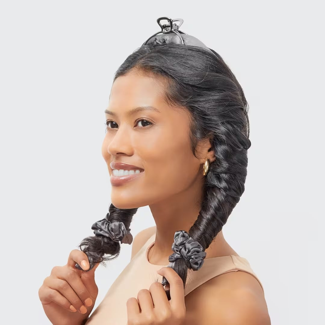 A black satin heatless curler with two included scrunchies.