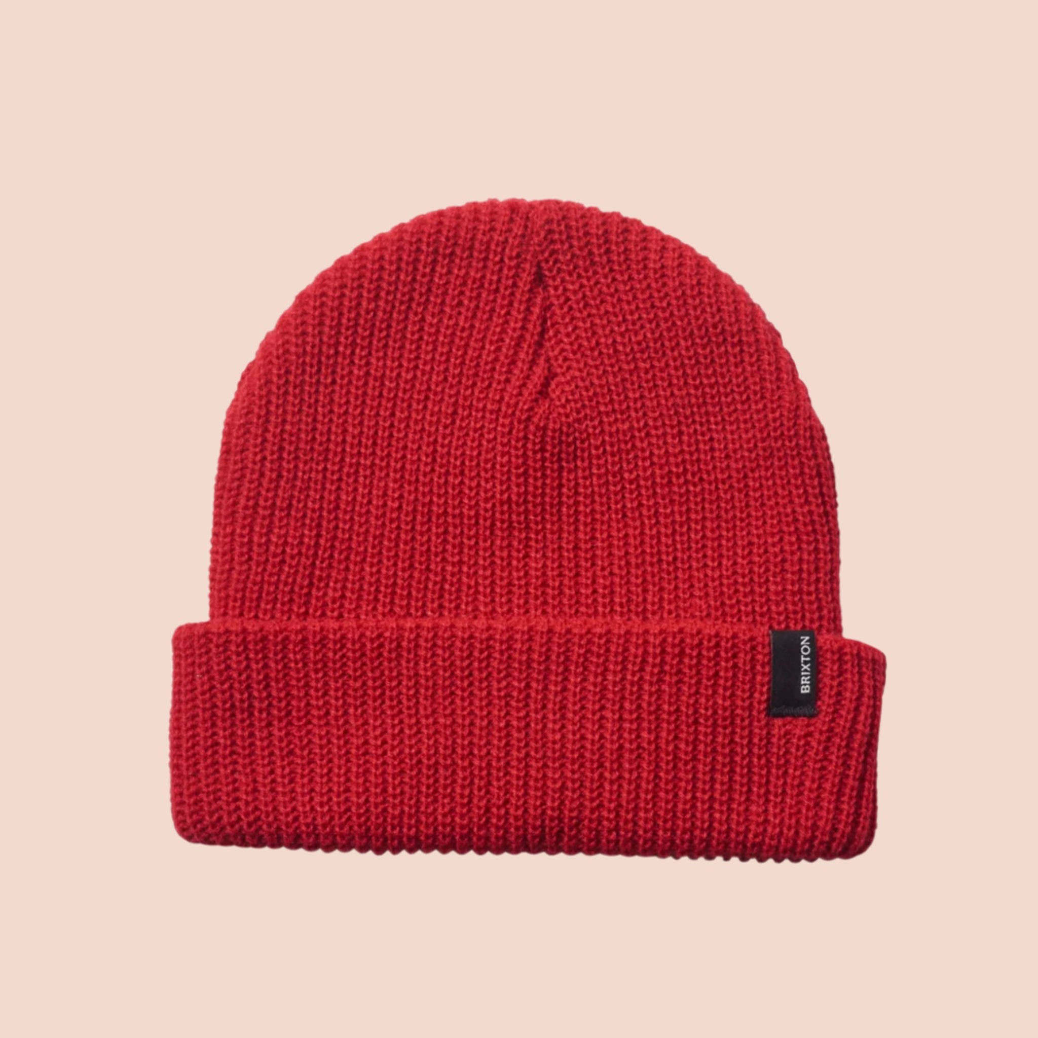 A red ribbed beanie. 