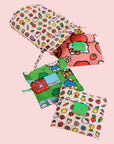 A set of three standard Baggu tote bags with three different Hello Kitty prints on them. 