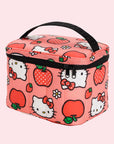 A pink and red Hellot Kitty patterned lunch box with a black handle and zipper. 