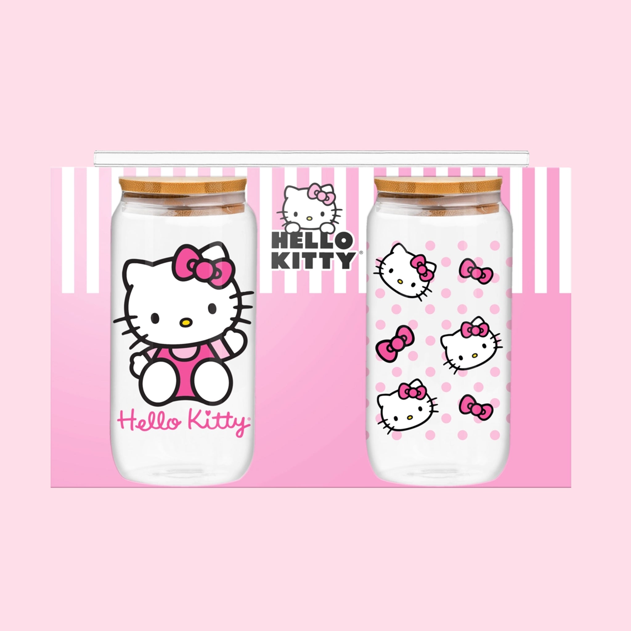 A set of two glass tumblers with hello kitty designs and glass straws. 