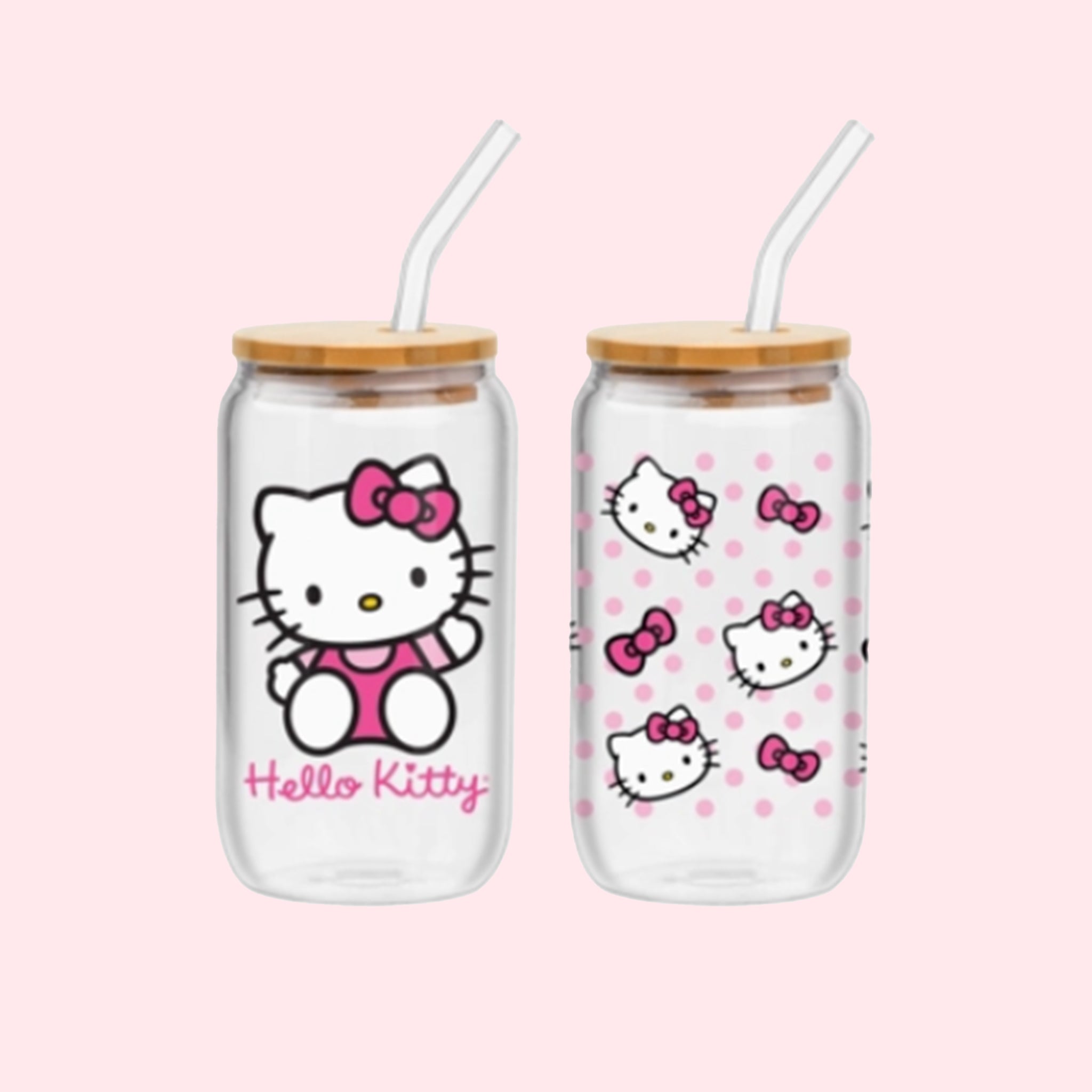 A set of two glass tumblers with hello kitty designs and glass straws. 