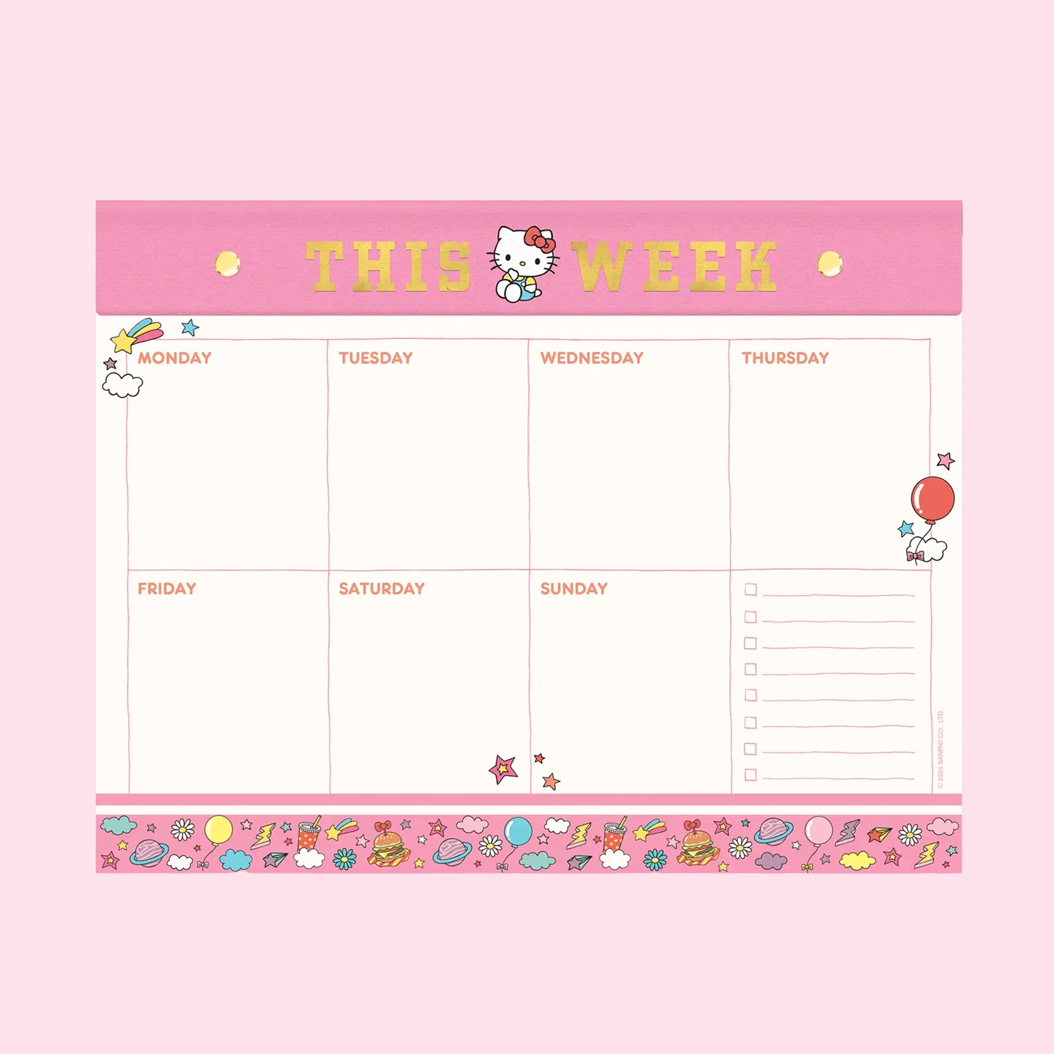 An undated pink and white planner pad with Hello Kitty graphics. 