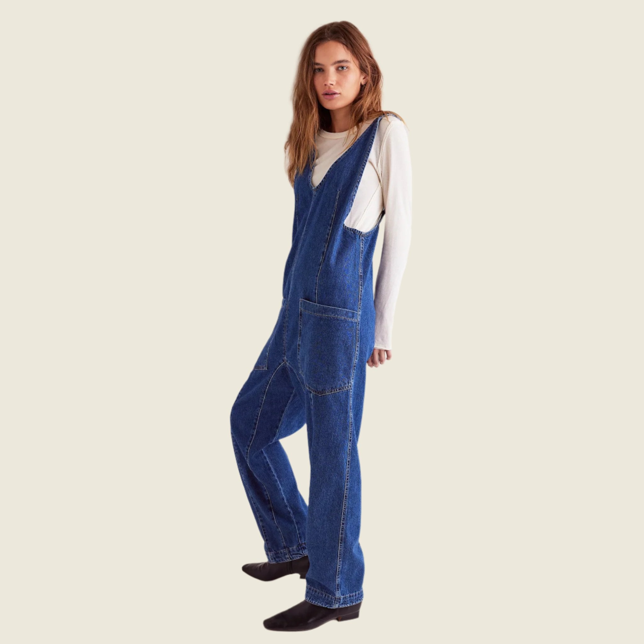 A dark blue denim jumpsuit. 