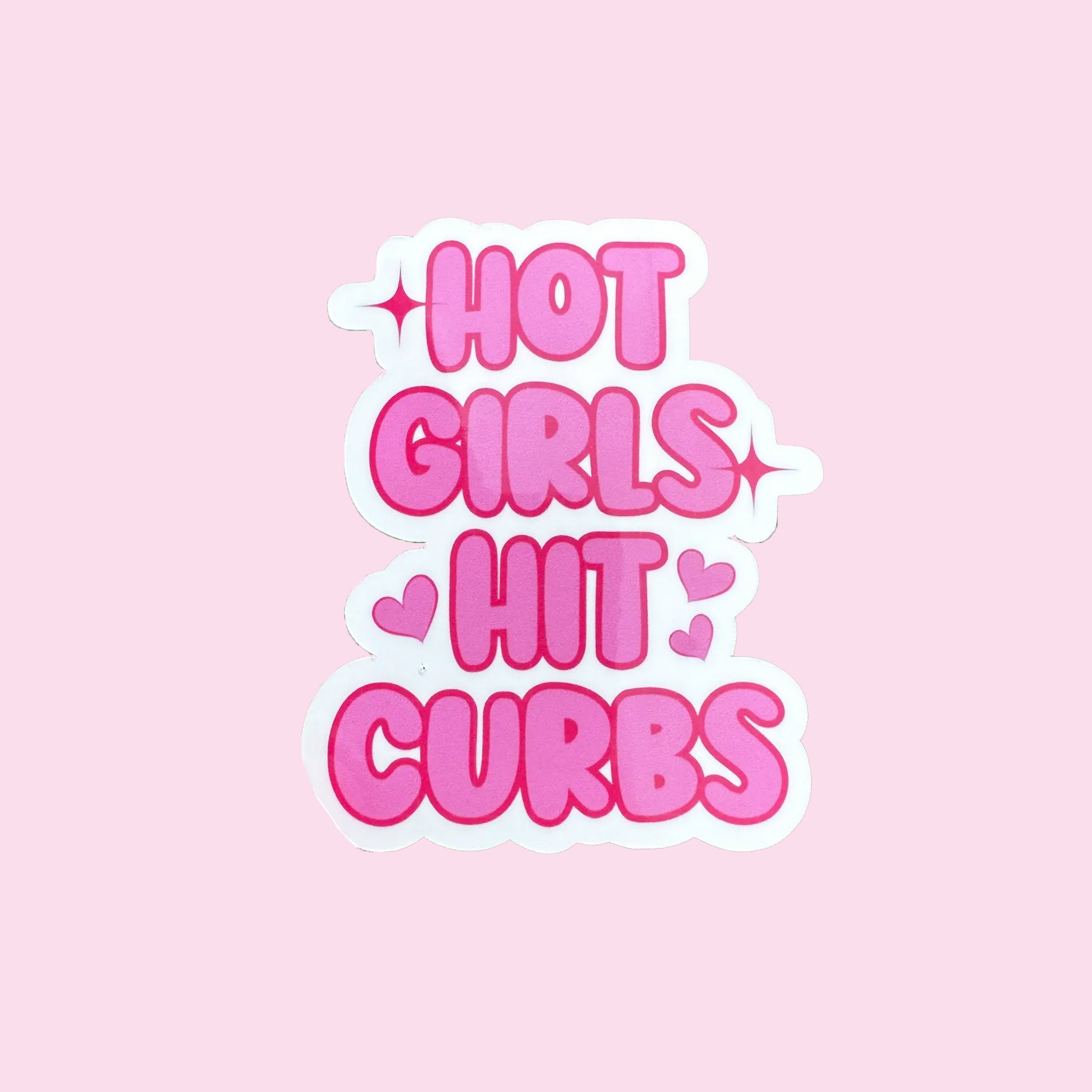 A hot pink sticker that reads, &quot;Hot Girls Hit Curbs&quot;.