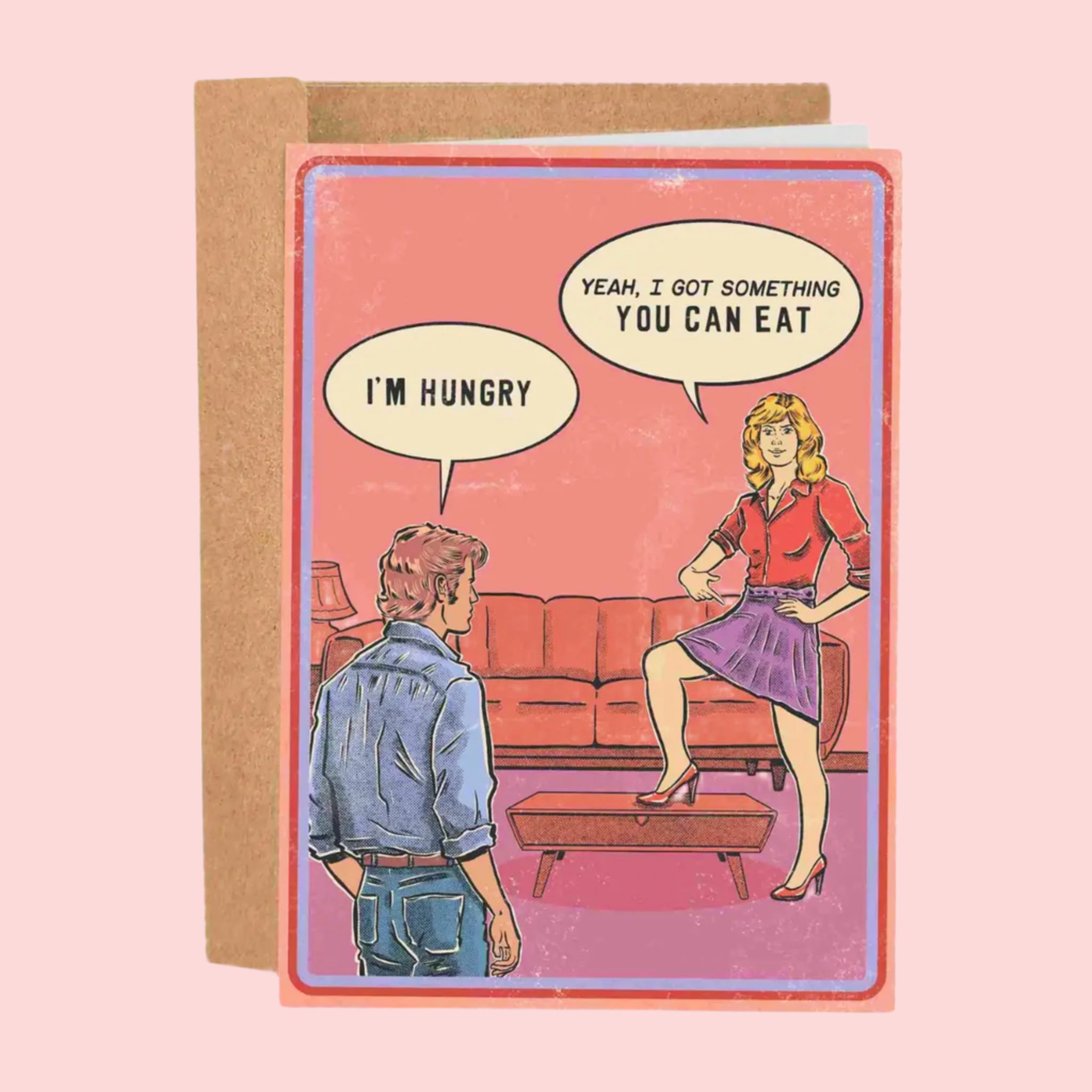 A pink  card with a couple looking at each other with speech bubbles. One speech bubble reads, &#39;I&#39;m hungry&#39; and the other responds, &#39;Yeah, I got something you can eat&#39;. 