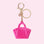 On a pink background is a hot pink jelly bag shaped bag charm. 