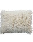 An ivory wool shag lumbar pillow. 