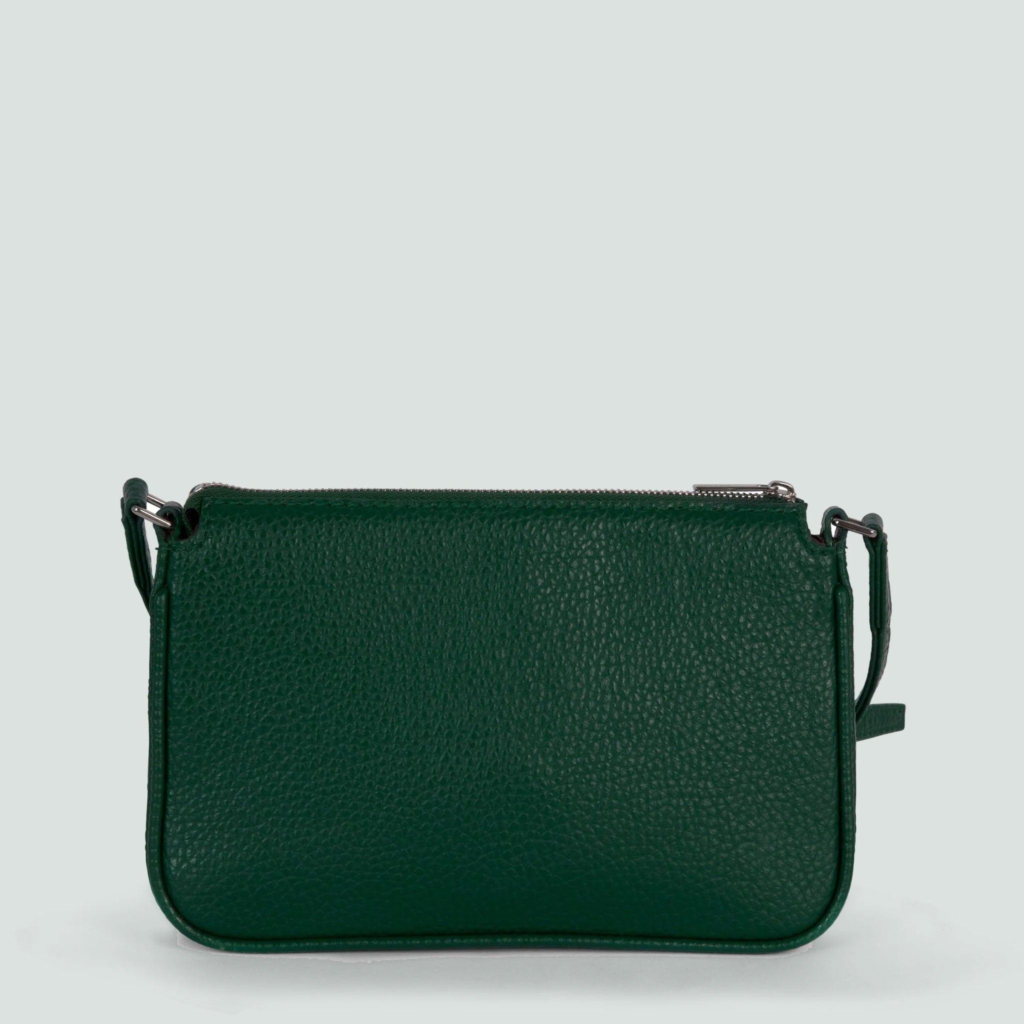 backside view of a deep green crossbody bag