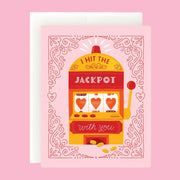 A pink card with a slots machine that reads, 'I Hit The Jackpot with you'. 