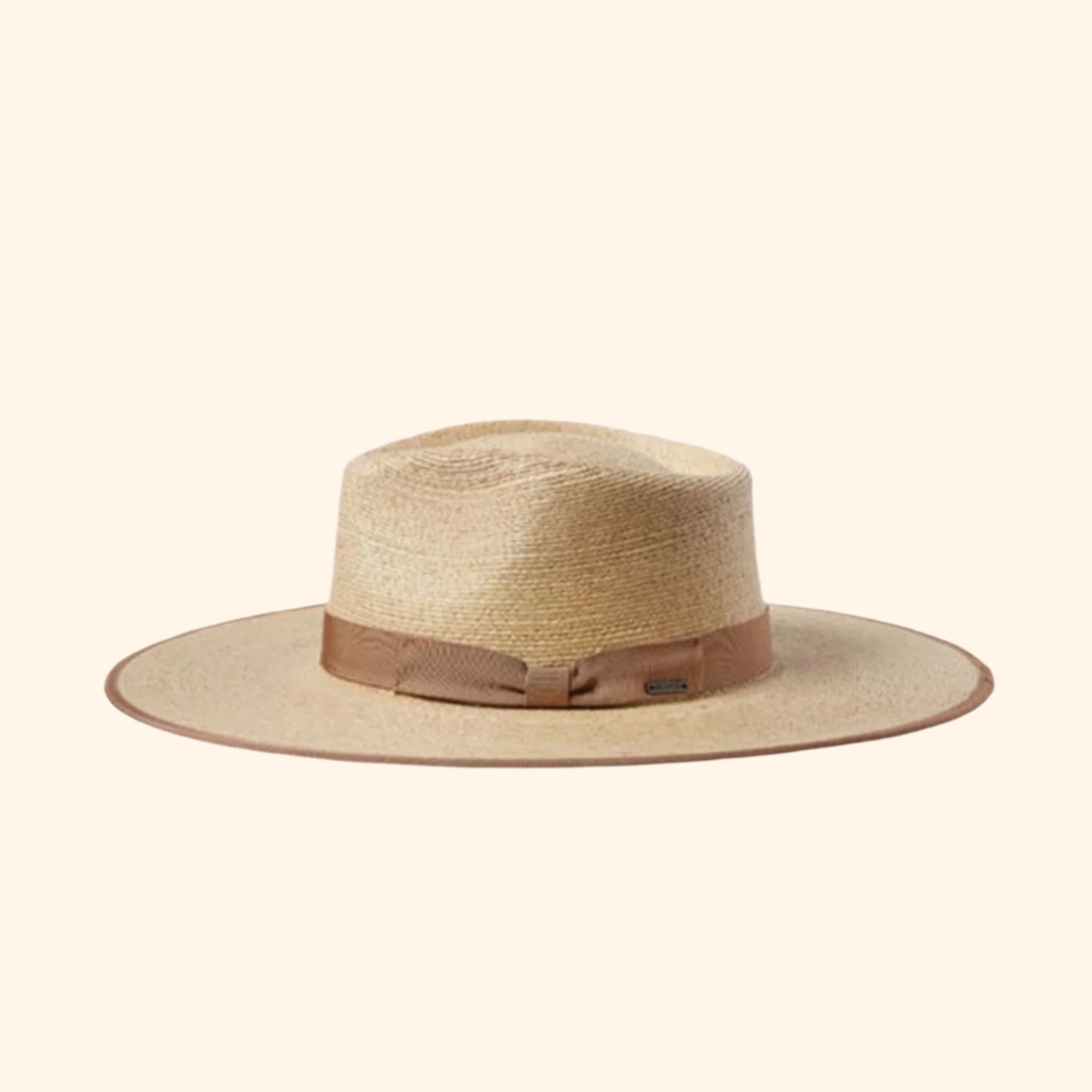 A neutral tan and natural colored rancher hat. 