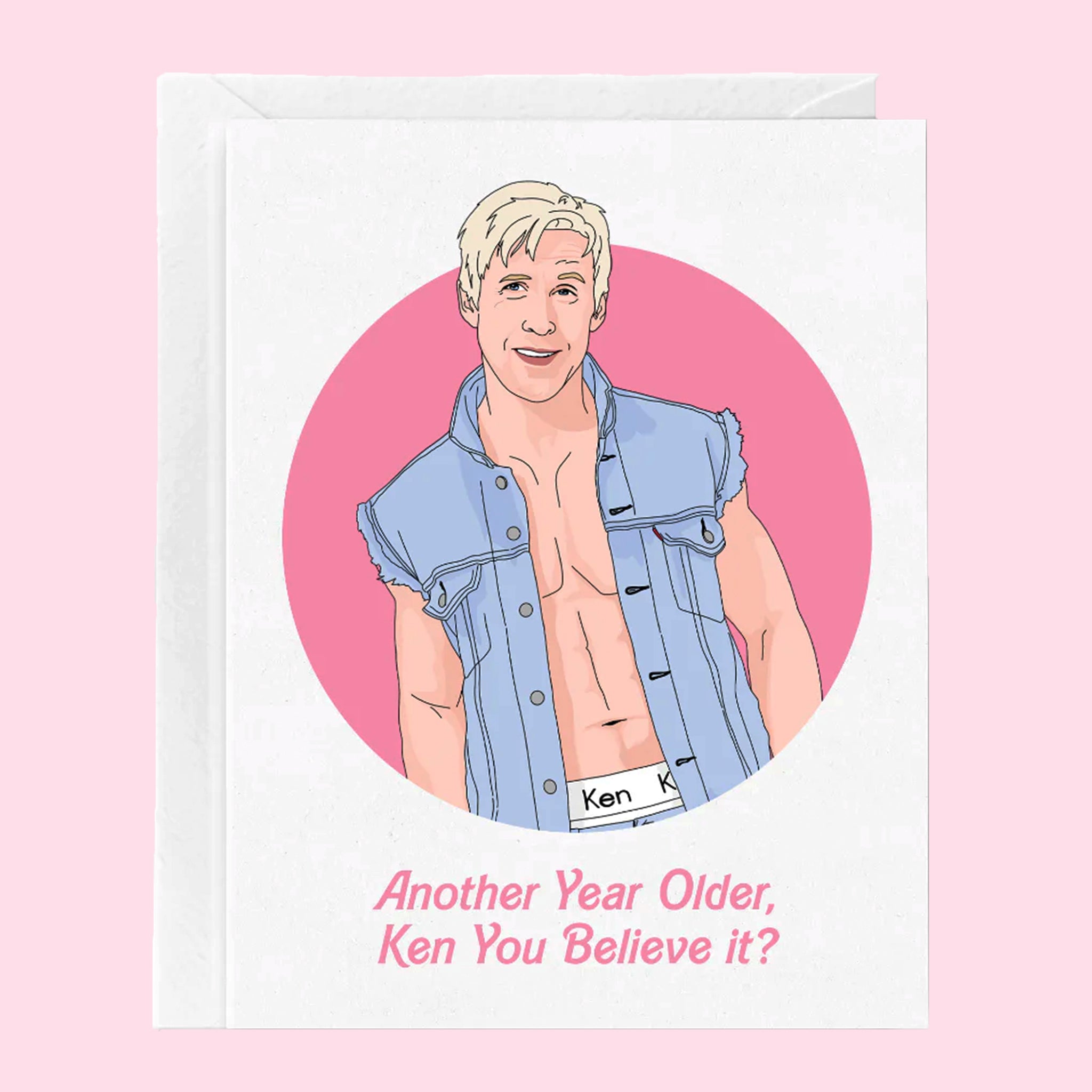 A pink and white birthday card with a graphic of Ken from Barbie and text below that reads, &quot;Another Year Older Ken You Believe it?&quot;. 