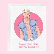 A pink and white birthday card with a graphic of Ken from Barbie and text below that reads, "Another Year Older Ken You Believe it?". 