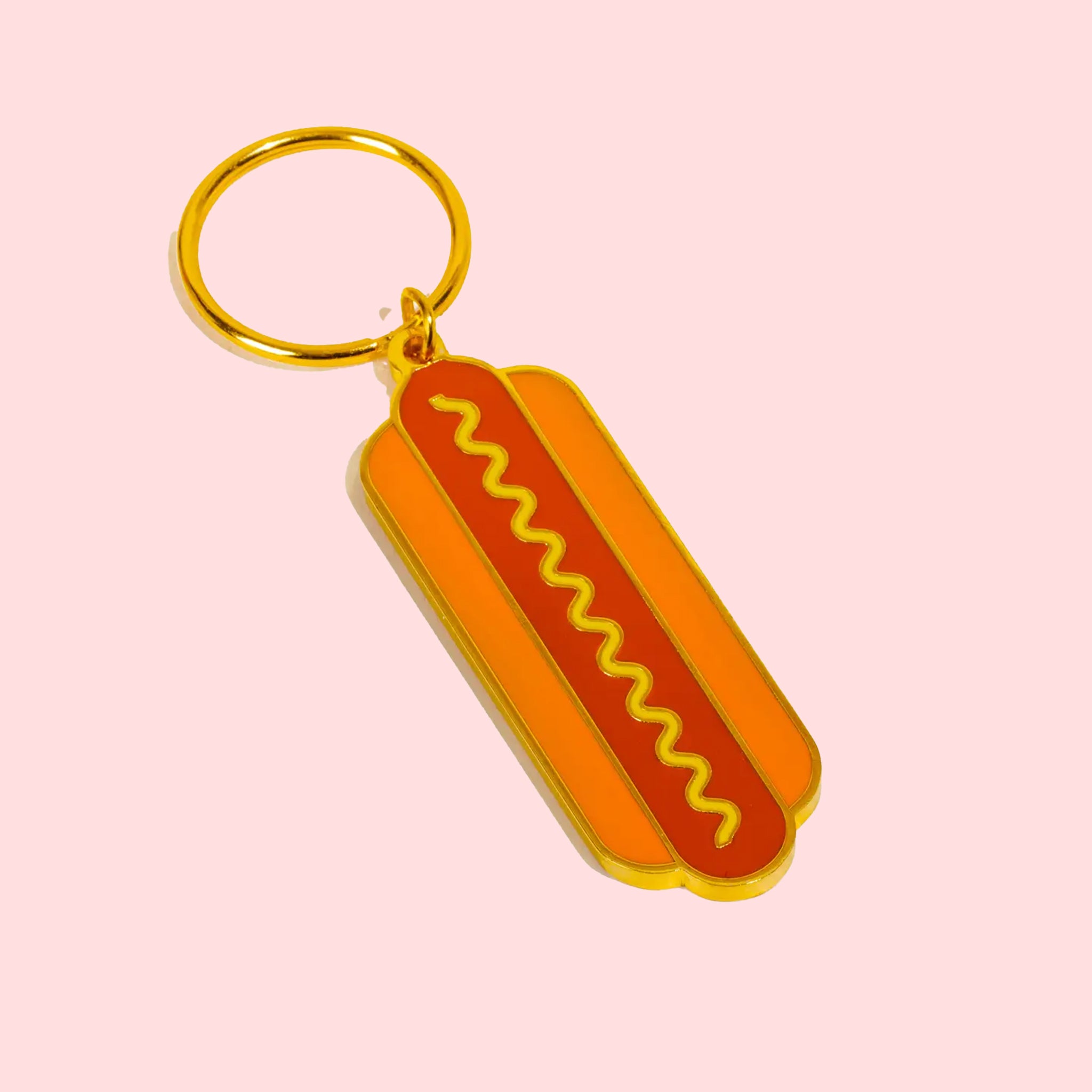 A hot dog shaped keychain with two sides. One keychain per purchase.