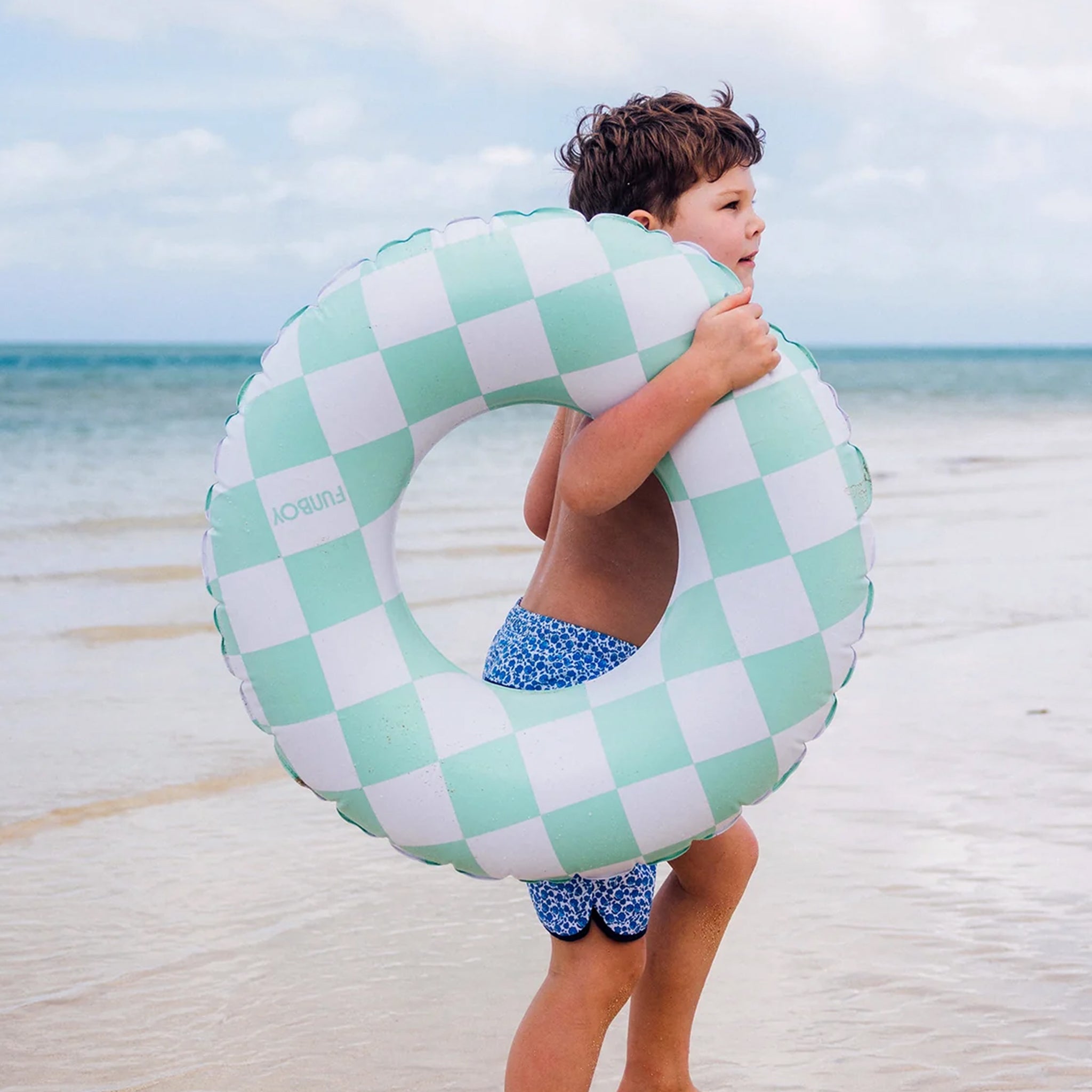 A blue and white checker pool ring float.