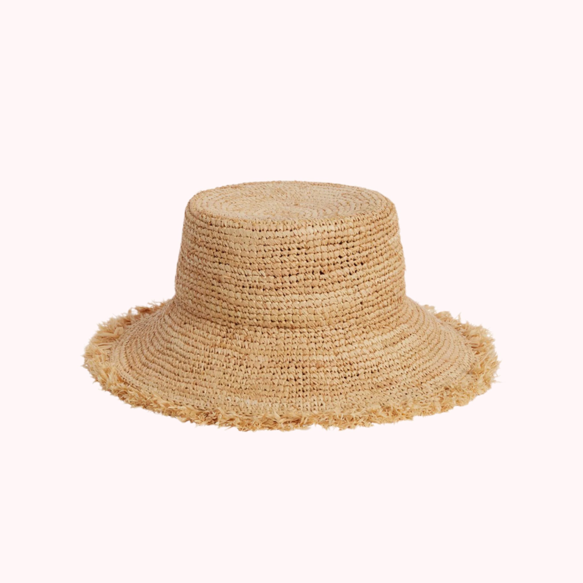 A neutral straw bucket hat for kids. 