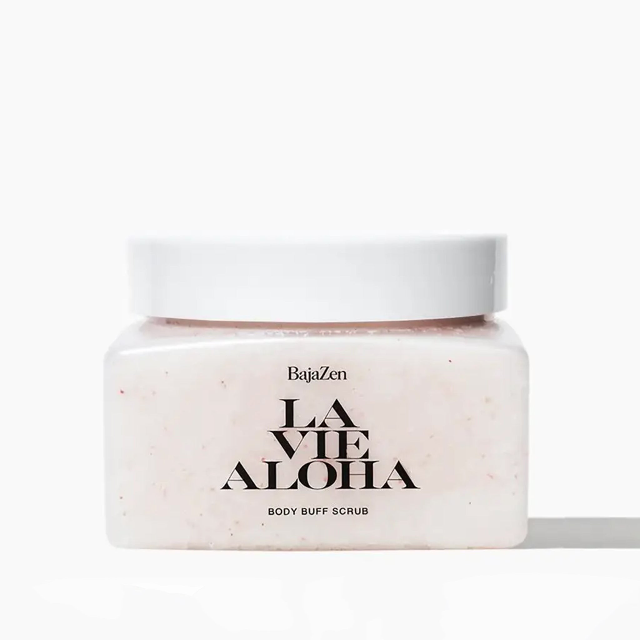 A clear container with a neutral body scrub inside, white lid and black text that reads, &quot;La Vie Aloha&quot;.