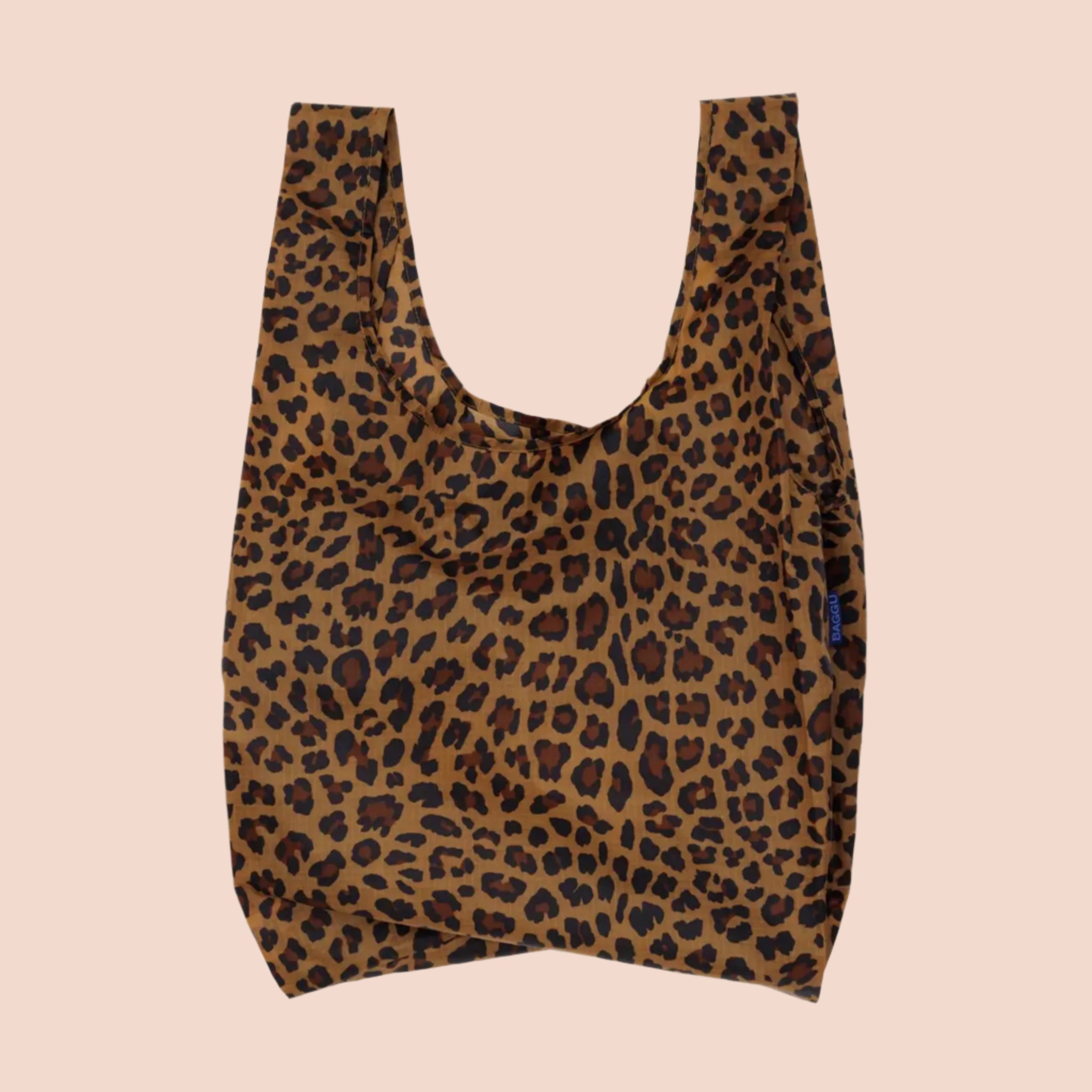 A nylon tote bag with a brown and black leopard print. 