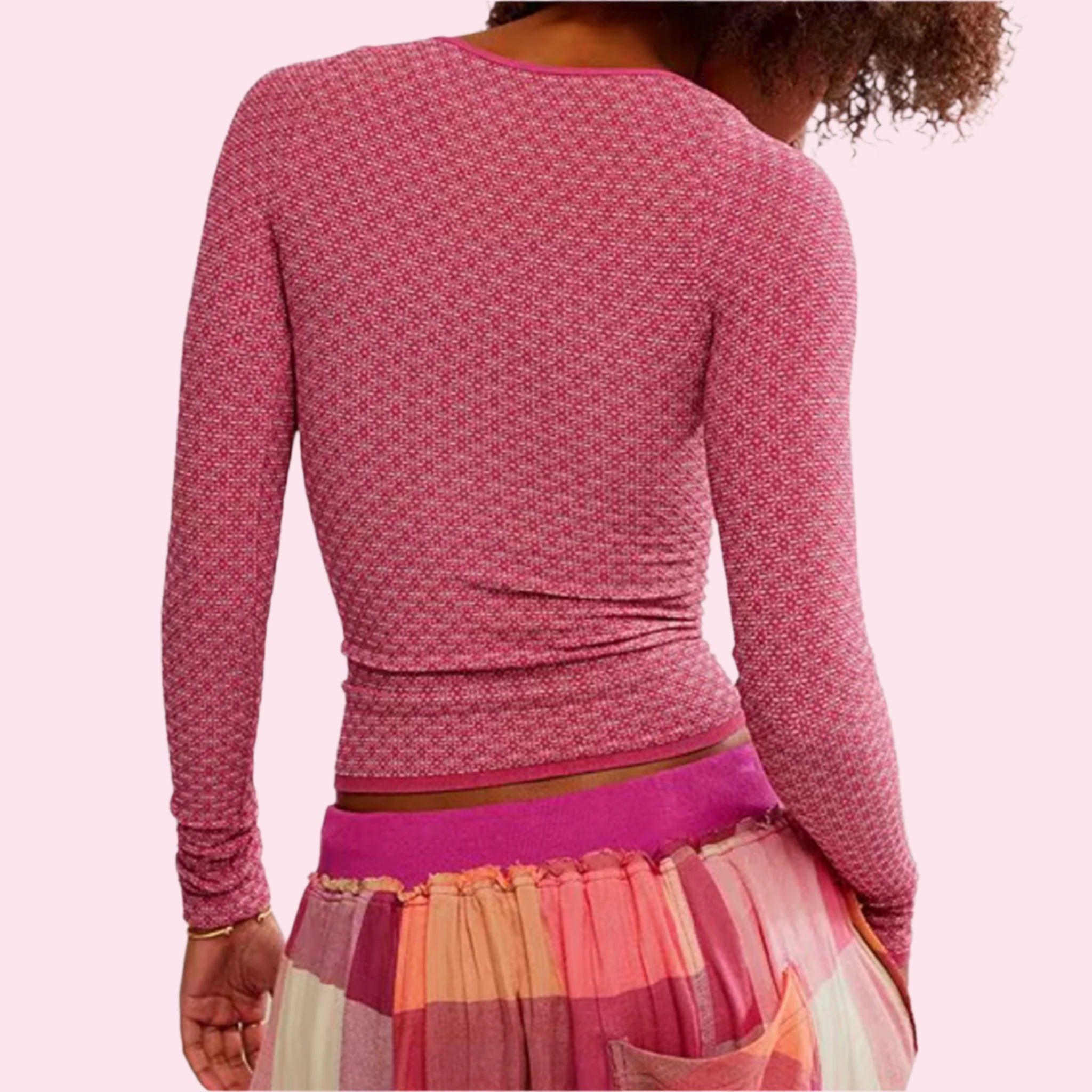 A hot pink long sleeve scoop neck shirt. 