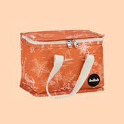 An orange and ivory lunch box with ivory canvas handles. 