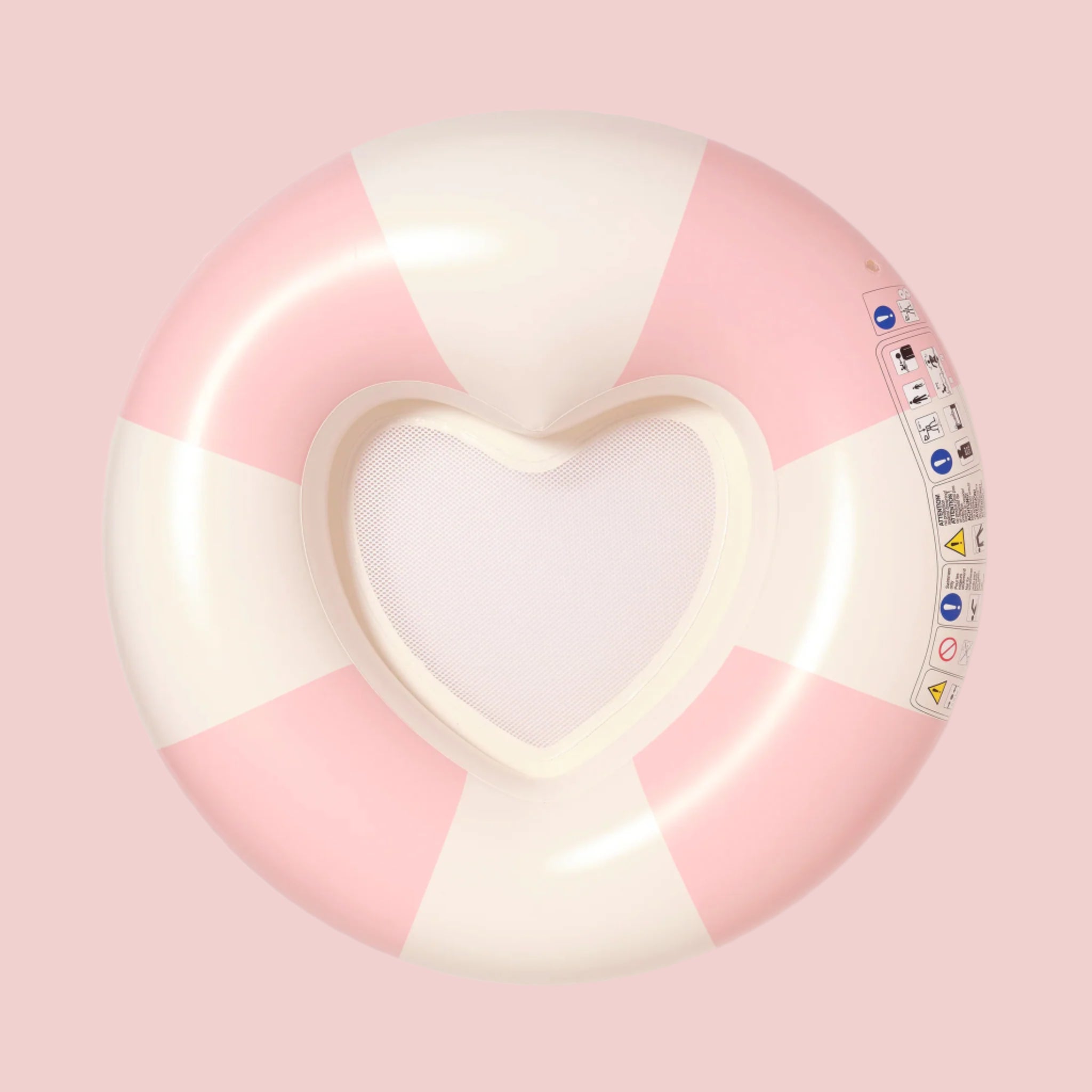 A pink and white striped pool float but the center is in the shape of a heart with a mesh backing. 