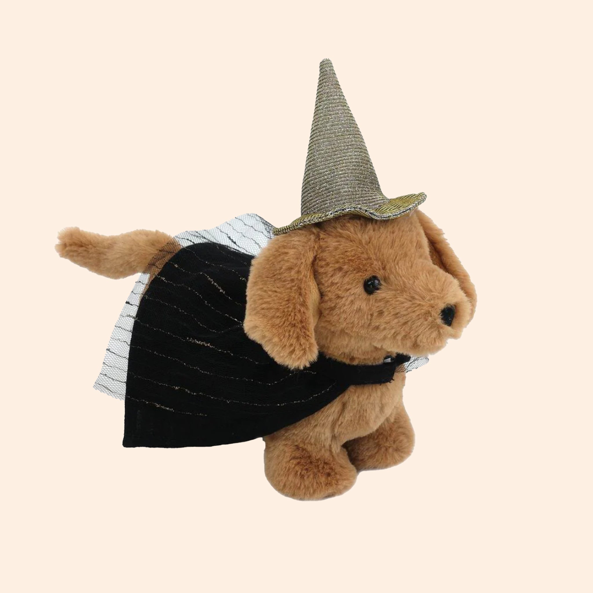 A tan daushund wiener dog shaped stuffed toy with a witch costume on. 