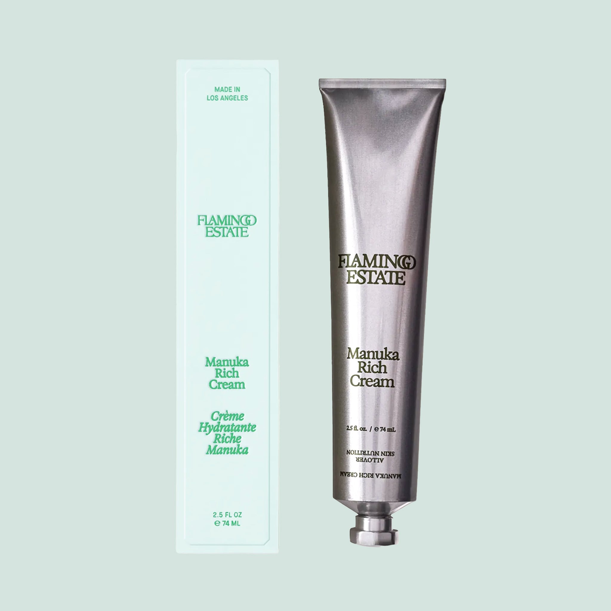 A silver tube of hand cream with black text that reads, &#39;Flamingo Estate Manuka Rich Cream&#39;. 