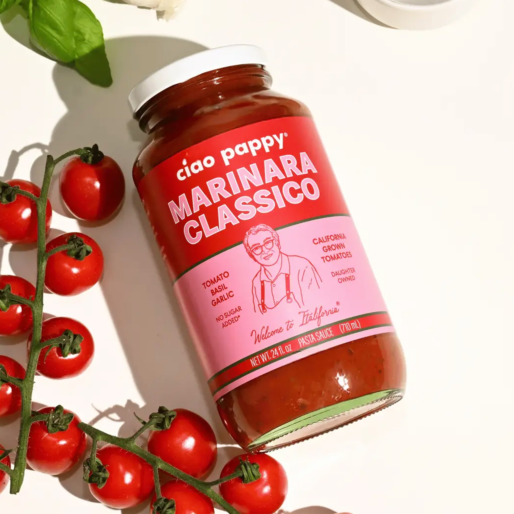 A glass jar of marinara with text that reads, 'ciao pappy Marinara Classico'. 