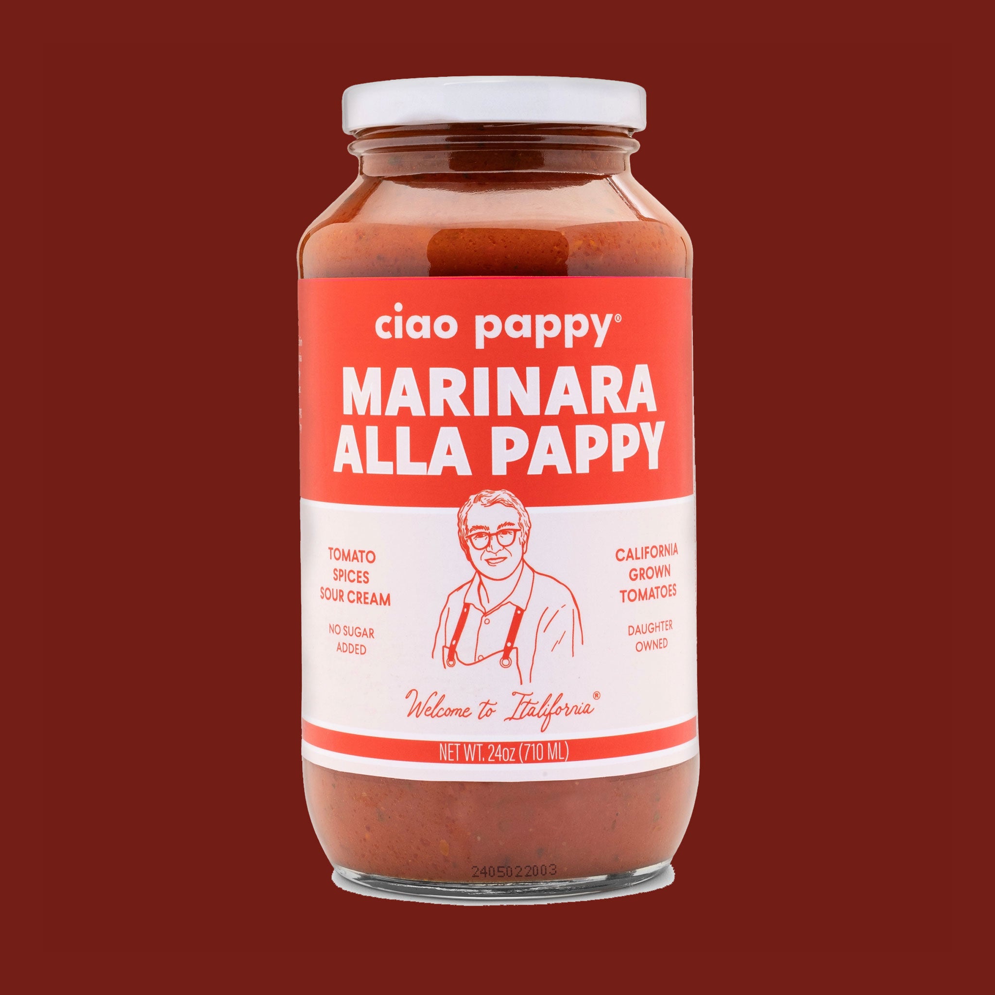 A glass jar of marinara sauce with white text that reads, &#39;ciao pappy Marinara Alla Pappy&#39;. 