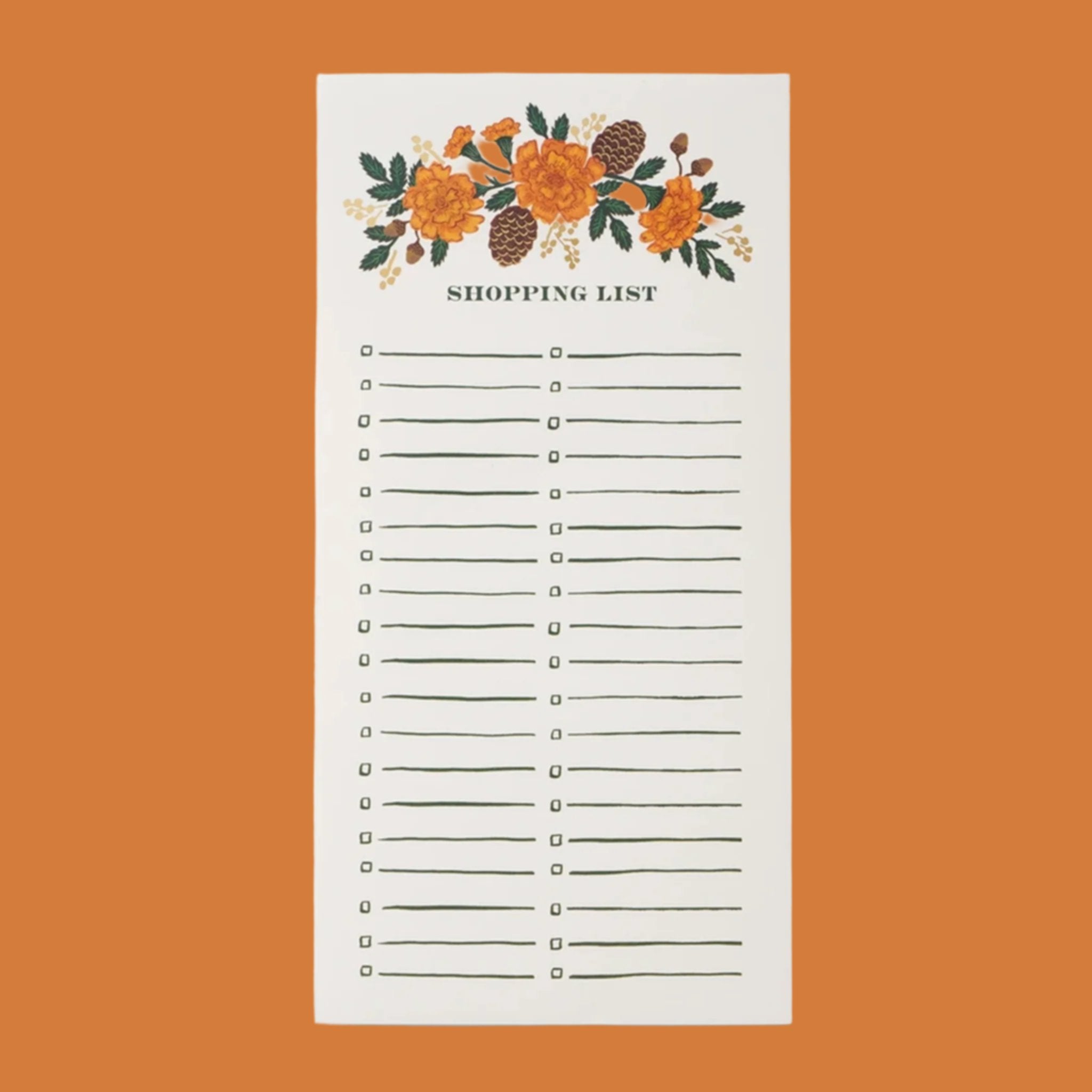 A white notepad shopping list with an orange floral print at the top. 