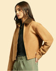 A brown work style jacket with a brown collar. 