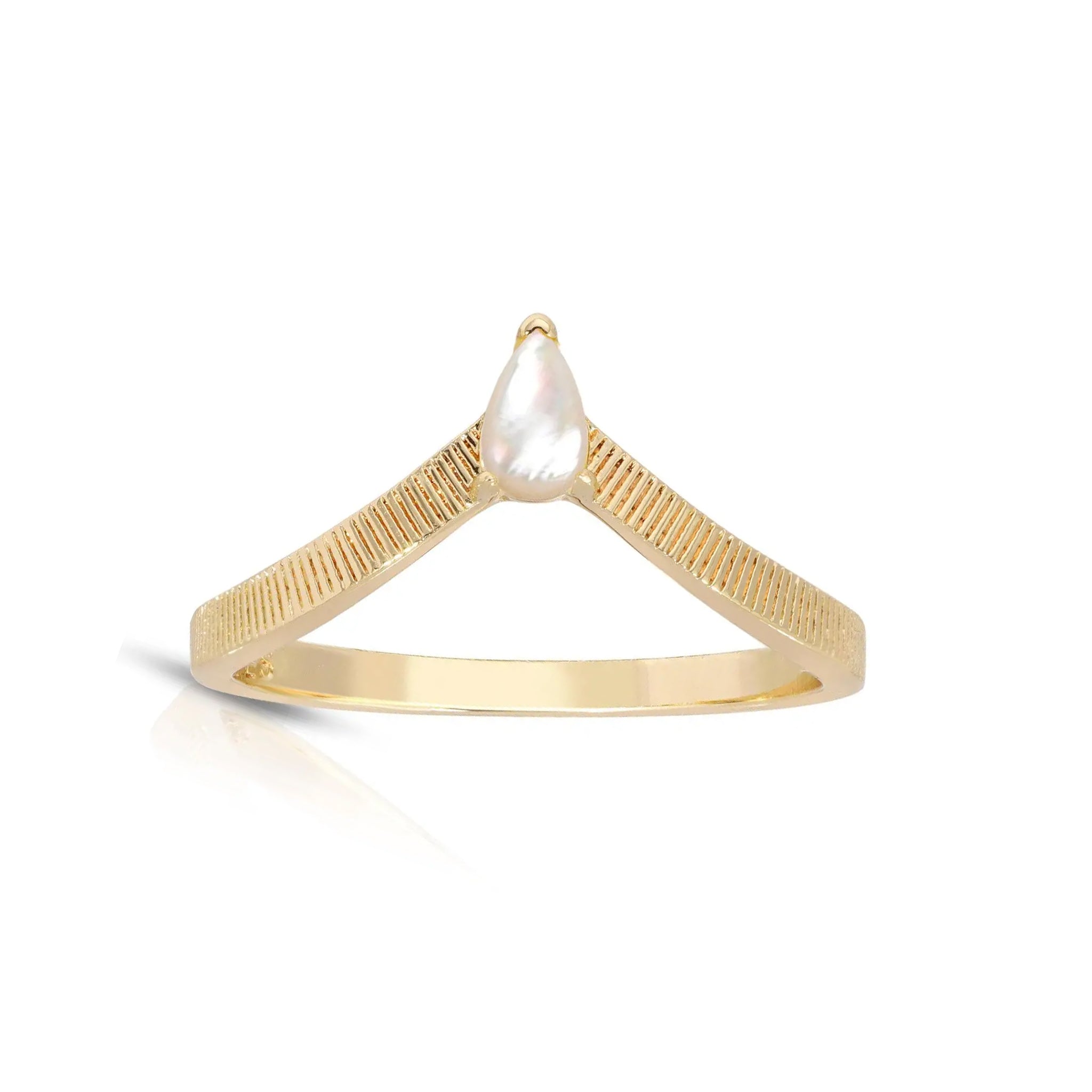 A gold band ring with etched line detailing and a white mother of pearl in the center.