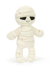 A mummy shaped stuffed toy.