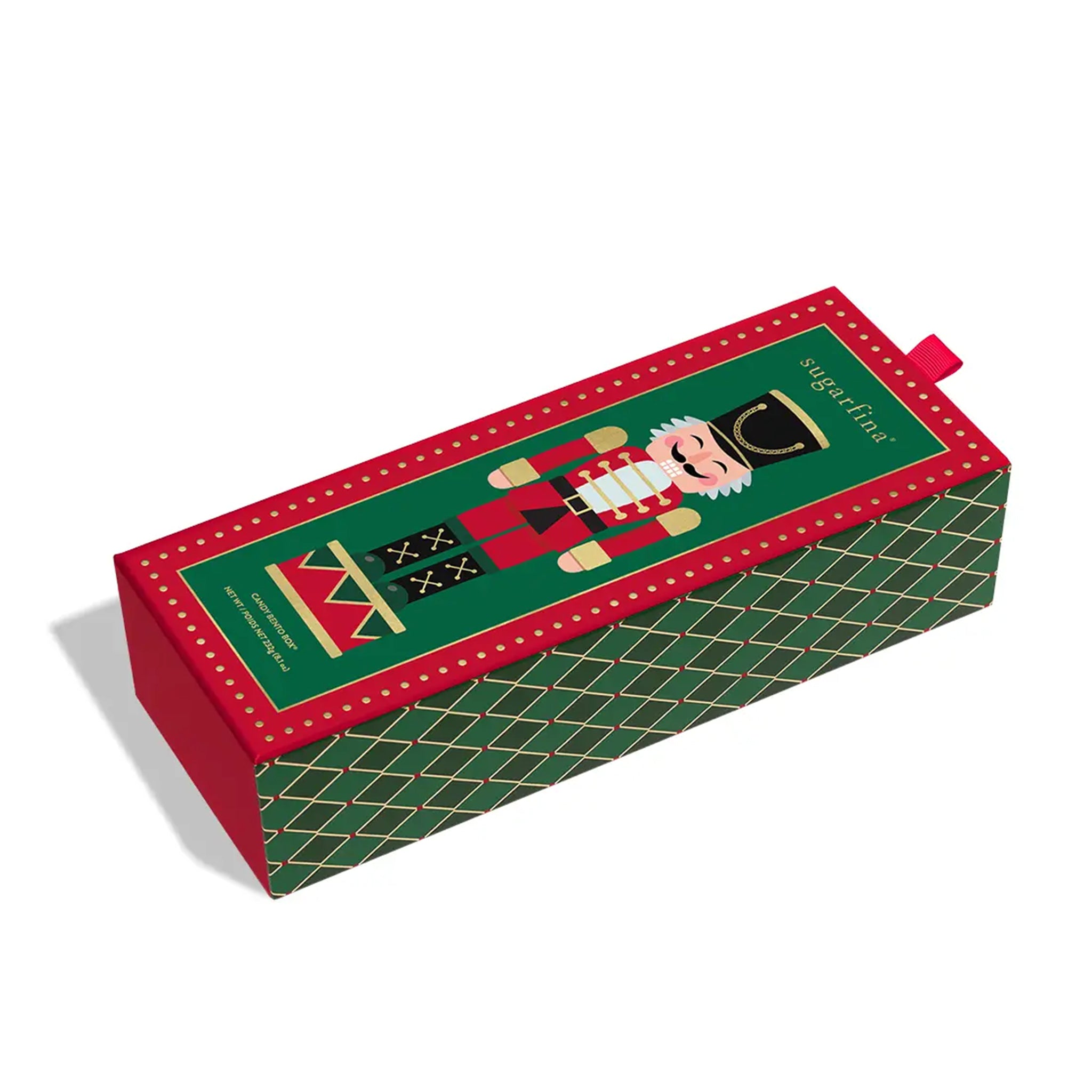 A box of four acrylic boxes of candy with a nutcracker graphic on top. 