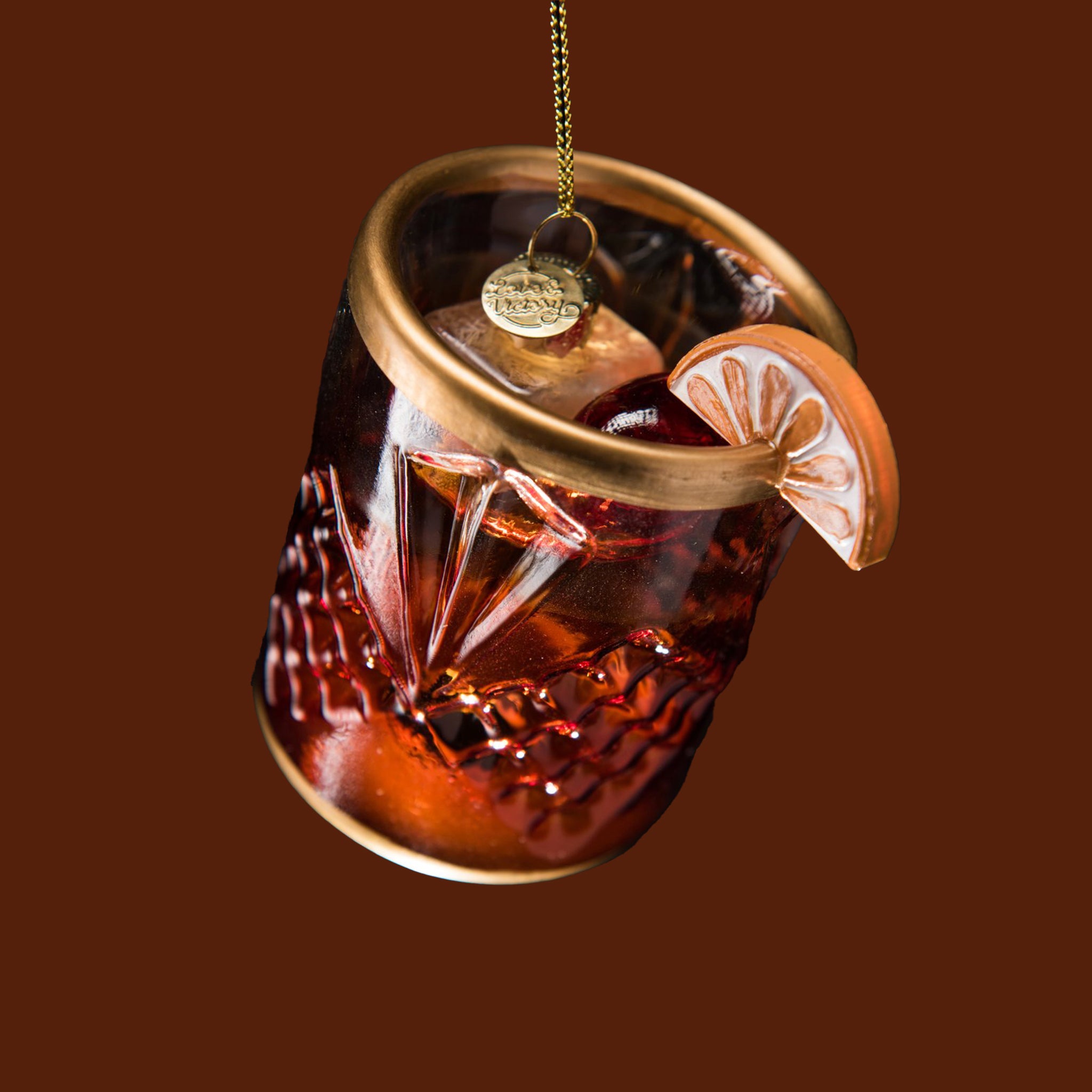 An old fashioned cocktail shaped ornament. 