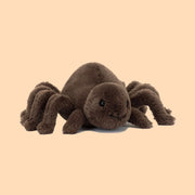 A brown spider stuffed animal. 